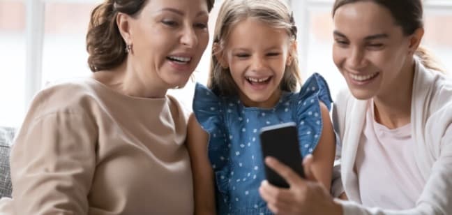 Women looking at smartphone